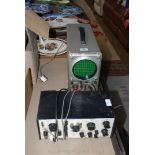 Two vintage Oscilloscopes, one being home-made, the other by Kikusui Electronics Corp.