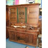 An arts and crafts Oak glazed top Dresser,