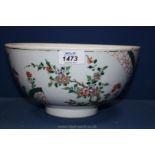 A Famille Verte Bowl with enamel tree and floral decoration, 24cm wide,