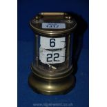 An unusual Brass carriage style Clock with flip-page numerals