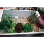 A quantity of glass including sherry glasses, green coloured glass vases, swan and large jug, etc.