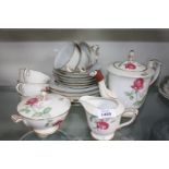 A Sango Japanese 'Monterey' pattern Teaset including teapot, sugar bowl with lid (chip to rim),