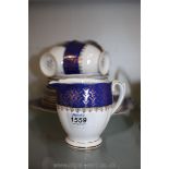A pretty cobalt blue gilded Queen Anne part Teaset including four cups (some as found), a milk jug,