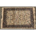 An Ivory ground Kashmir Rug,