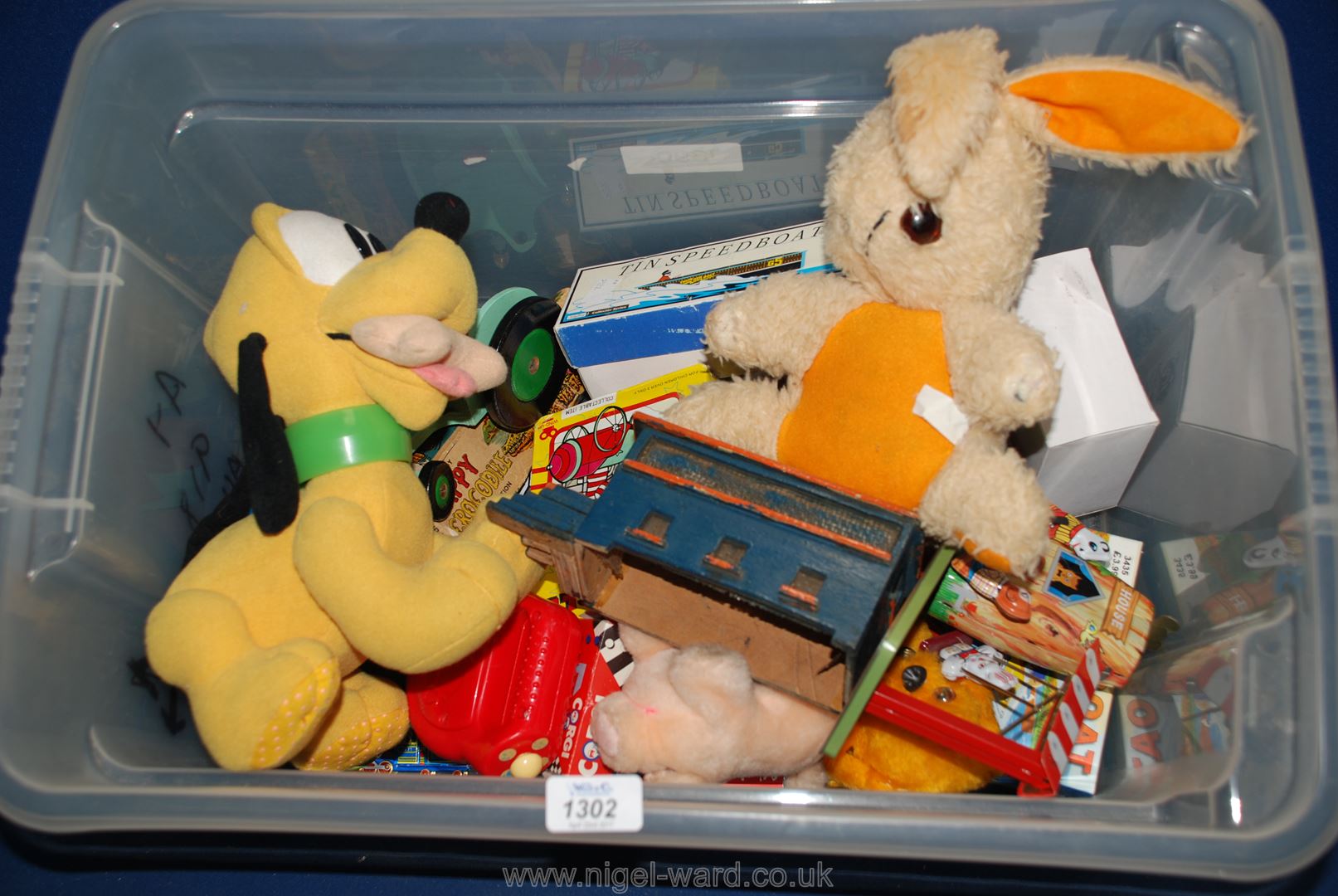 A box of vintage Toys including plush Pluto, scratch built tractor, wooden train, tin plate toys,