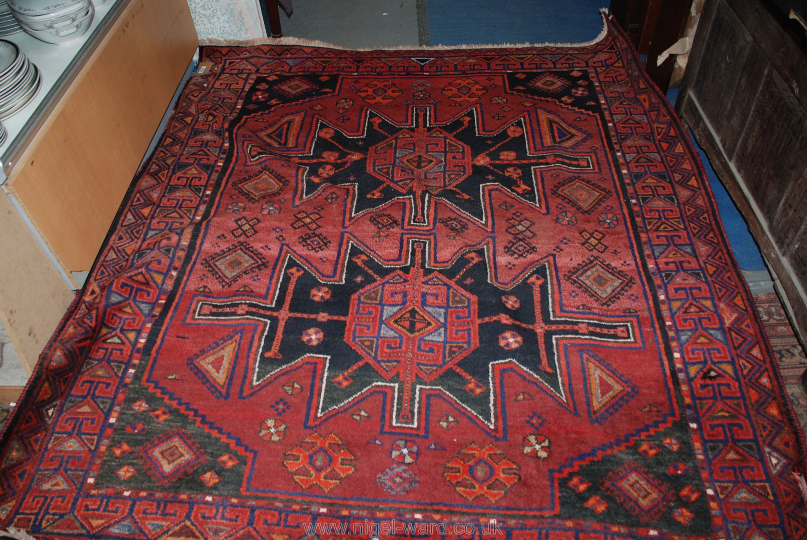 An Afghan Persian type Wool Carpet 6' 9" x 5' 10" approx