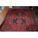 An Afghan Persian type Wool Carpet 6' 9" x 5' 10" approx