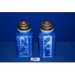 A very rare pair of 19th century flow blue pickle jars,