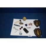 Miscellaneous enamel badges, penknives, globe, pencil sharpener,