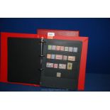 A Red Prinz stamp album with 40 hanger sheets, British Empire and Commonwealth mix mainly G VI,