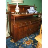 An Edwardian Mahogany Buffet Sideboard, having upstand back with two shelves on turned supports,