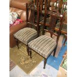 A pair of Victorian Walnut frame Dining Chairs, shaped and carved back rails with hand grip,