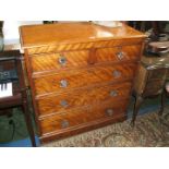 A Victorian Satinwood Chest of two short over three long graduated drawers,