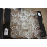 A quantity of mixed cut glass drinking glasses including sherry, wine,