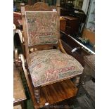A Victorian Beech show frame Parlour easy Chair having carved top rail and back supports,
