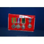A group of four Military Medals - WWII Hereford Regiment including Efficiency Medal Bar