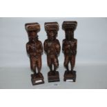 A group of 3 carved figures of musicians dressed in 16th century costume c.1900 (some damage).