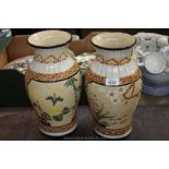 A pair of tall Vases,