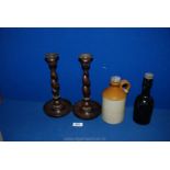 A pair of oak Candlesticks with sconces,