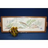 A three tile hand-painted Plaque of Salmon/trout possibly Poole/Dunmore set into a tray and a