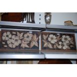 A pair of Ceramic Floral Plaques mounted on board, signed Hugh York,
