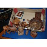 A quantity of Treen including carved heads, napkin rings, nutcracker, corkscrew, clogs, etc.