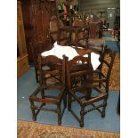 A reproduction Oak circular extending Dining Table with butterfly leaf,