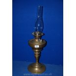 A Victorian Brass Oil Lamp and chimney