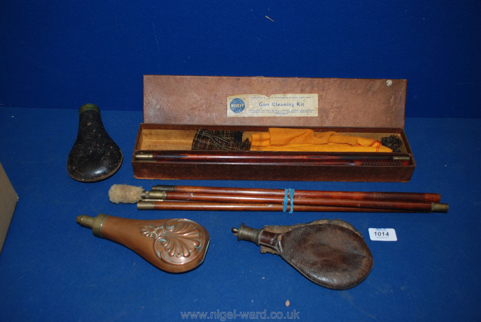 A Webley 12 bore Gun Cleaning Kit, plus two sets of rods, a copper Powder Flask,