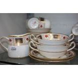 A Royal Crown Derby part Tea/Dinner Service with imari border including milk jug,