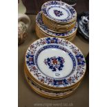A quantity of Mintons dinnerware in blue and orange oriental style decoration including soup plates,