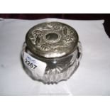 A Silver lidded cut glass Powder Jar.