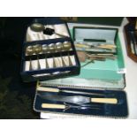 A cased Carving Set, Dessert Spoons, French Horn handled Knives, etc.