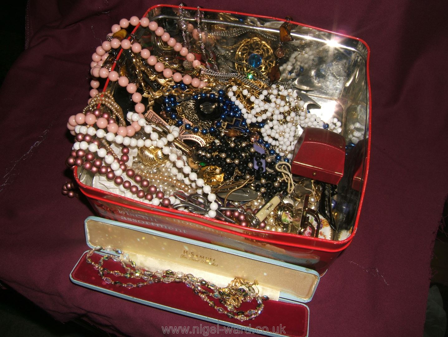 A tin of miscellaneous costume jewellery, beads, etc. - Image 2 of 2