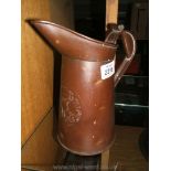 An Arts and Crafts style copper Water Jug