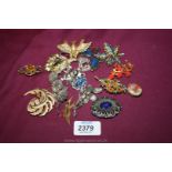 A quantity of costume Jewellery including brooches