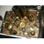 A quantity of brass including shell cases, candlesticks, ashtray, etc.