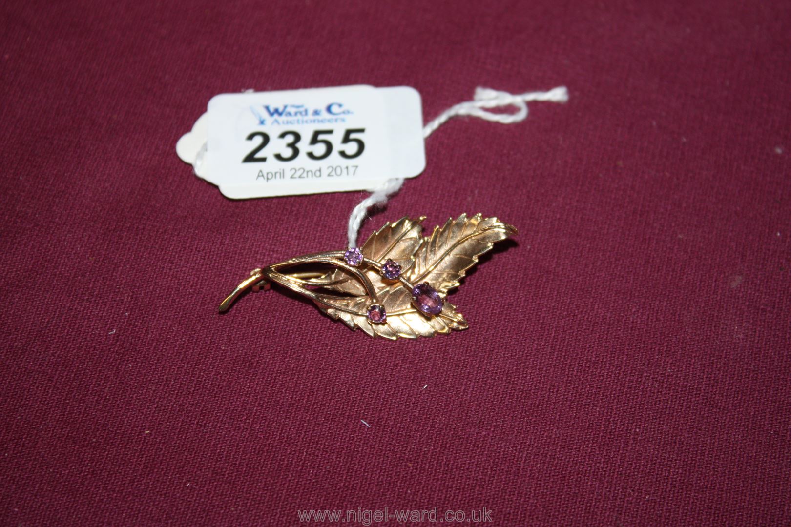 A 9ct Gold leaf Brooch set with four amethysts