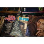 A box of L.P's - Bob Marley, songs of praise, etc.