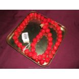 A 1930's red glass bead Necklace.