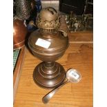 An Oil Lamp and a plated ladle