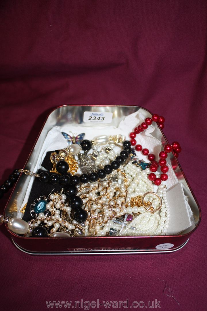 A 'Pirate' box of mixed Costume Jewellery