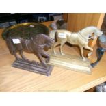 A Brass horse Doorstop and another