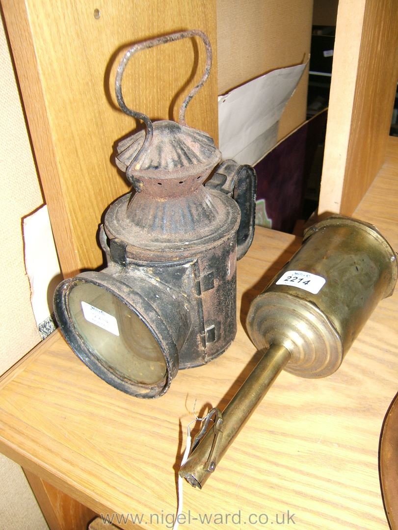 A Brass Spit Jack and an old Railway Lamp