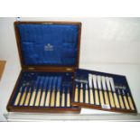 A cased Mappin & Webb set of twelve fish Knives and Forks