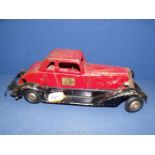 A tinplate model of a Fire Chief car.