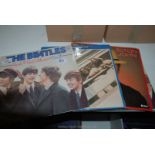 Four Beatles LPs and Elton John LP.