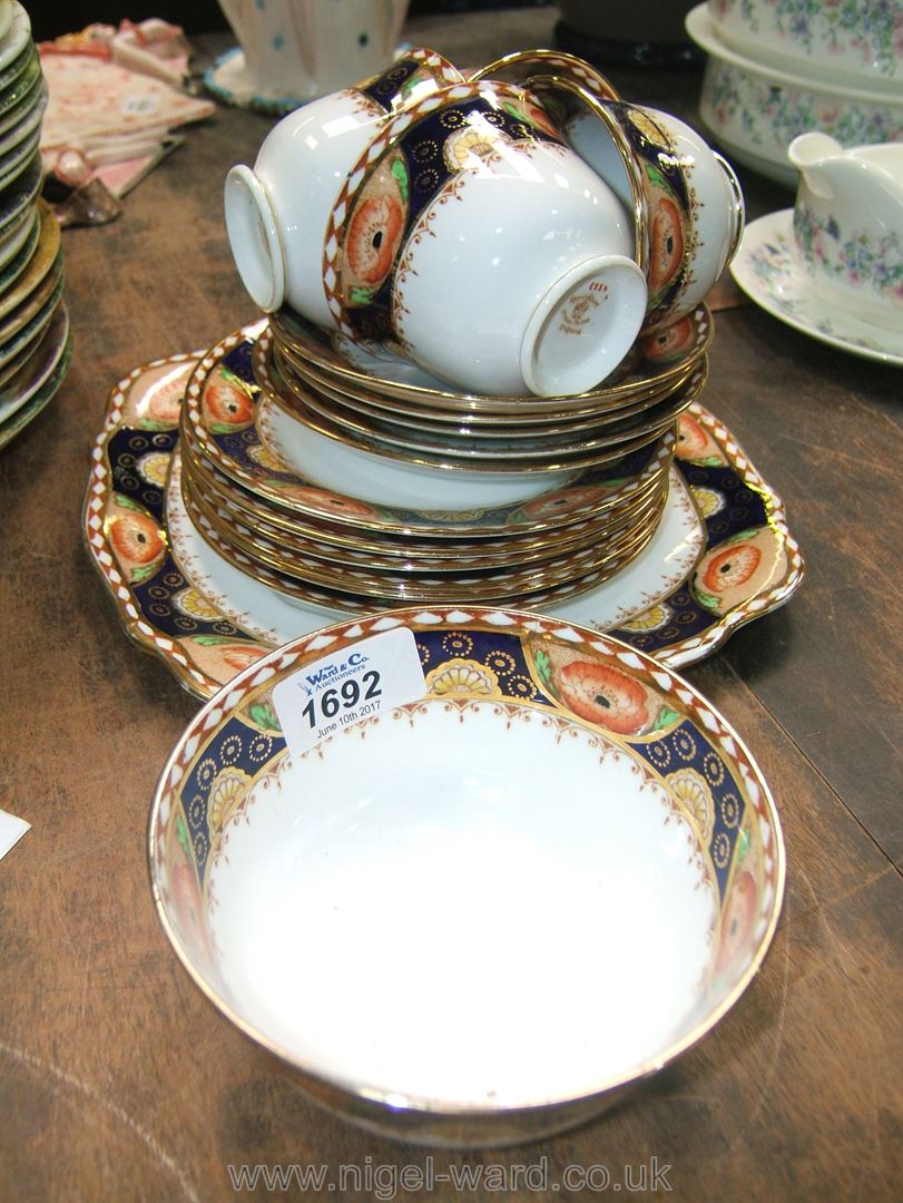 A Royal Albert Crown China part Teaset including four cups, five saucers, six tea plates,