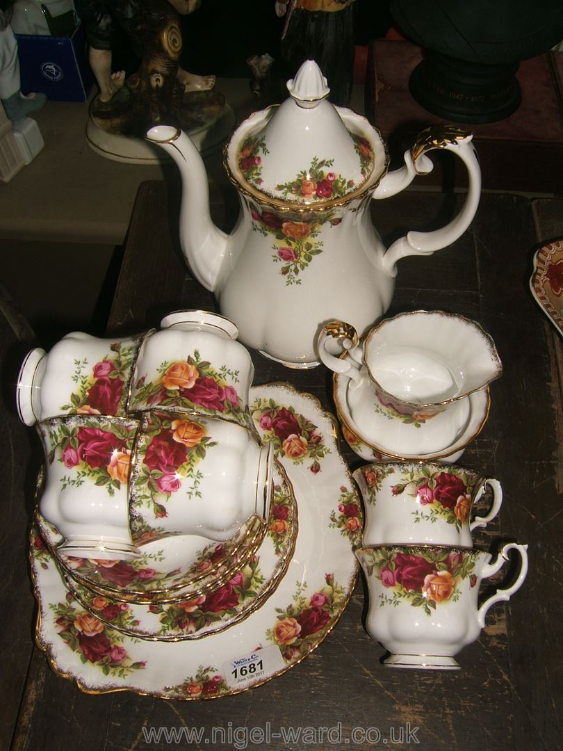 A quantity of Royal Albert 'Old Country Roses' comprising Coffee Pot, sugar bowl and cream jug,