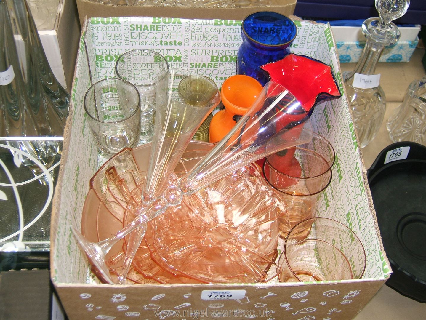 A quantity of glass including a pink fruit bowl and matching saucers and four drinking glasses,